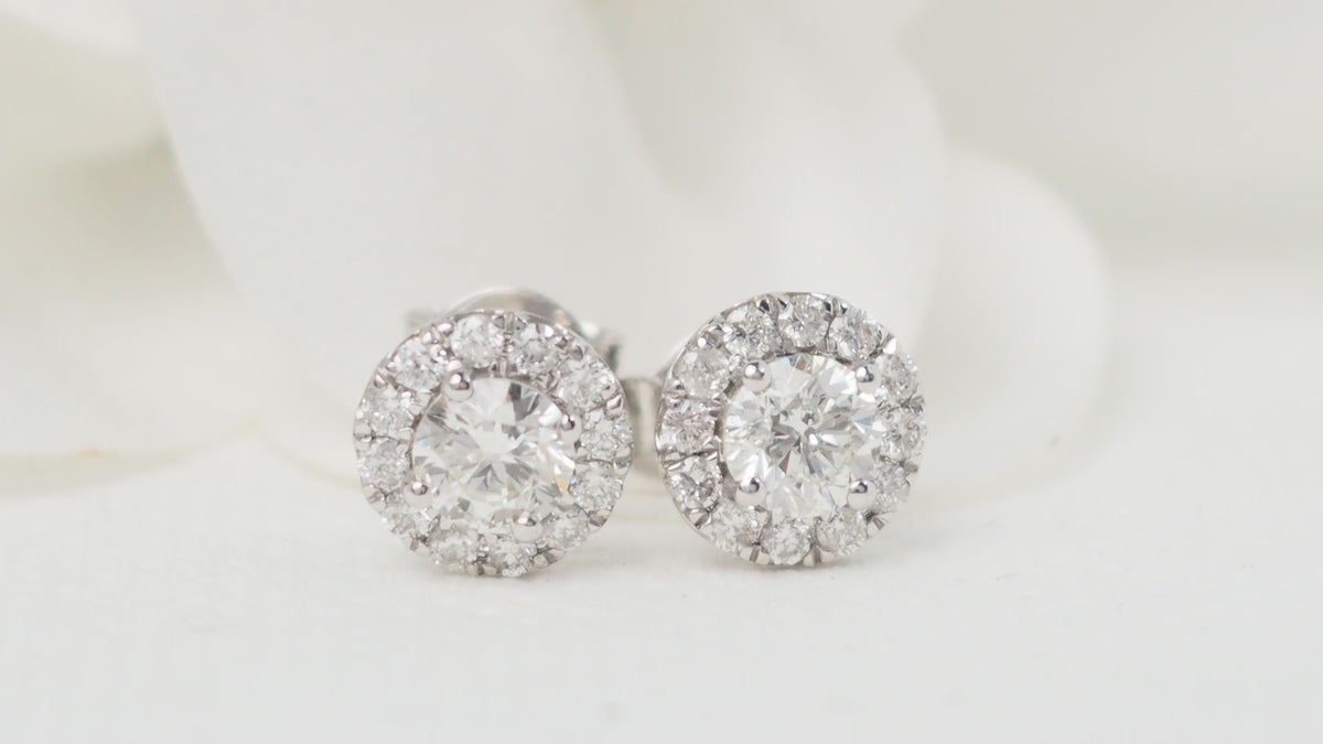 Boucles d'oreilles marguerite en or blanc et diamants