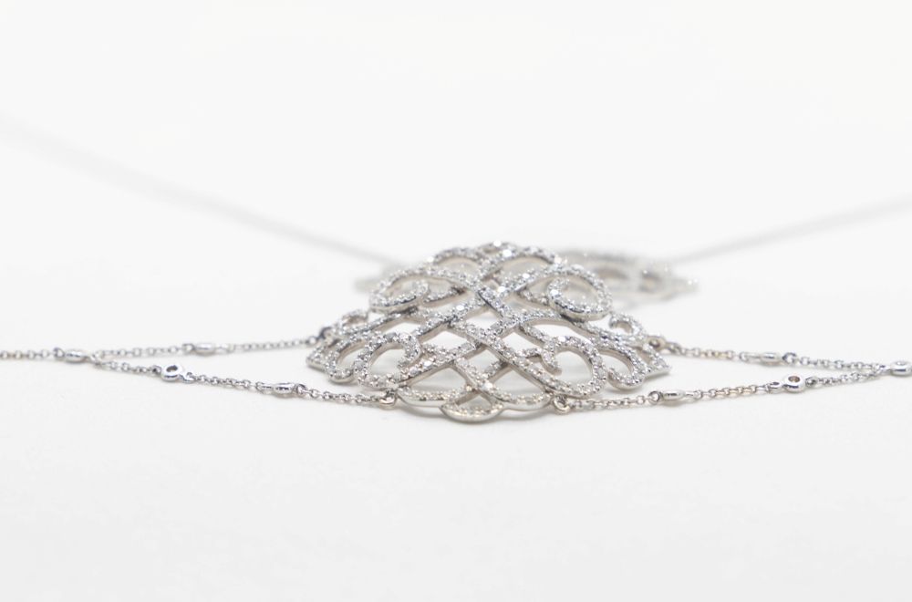 Bracelet maille jaseron en or blanc et diamant