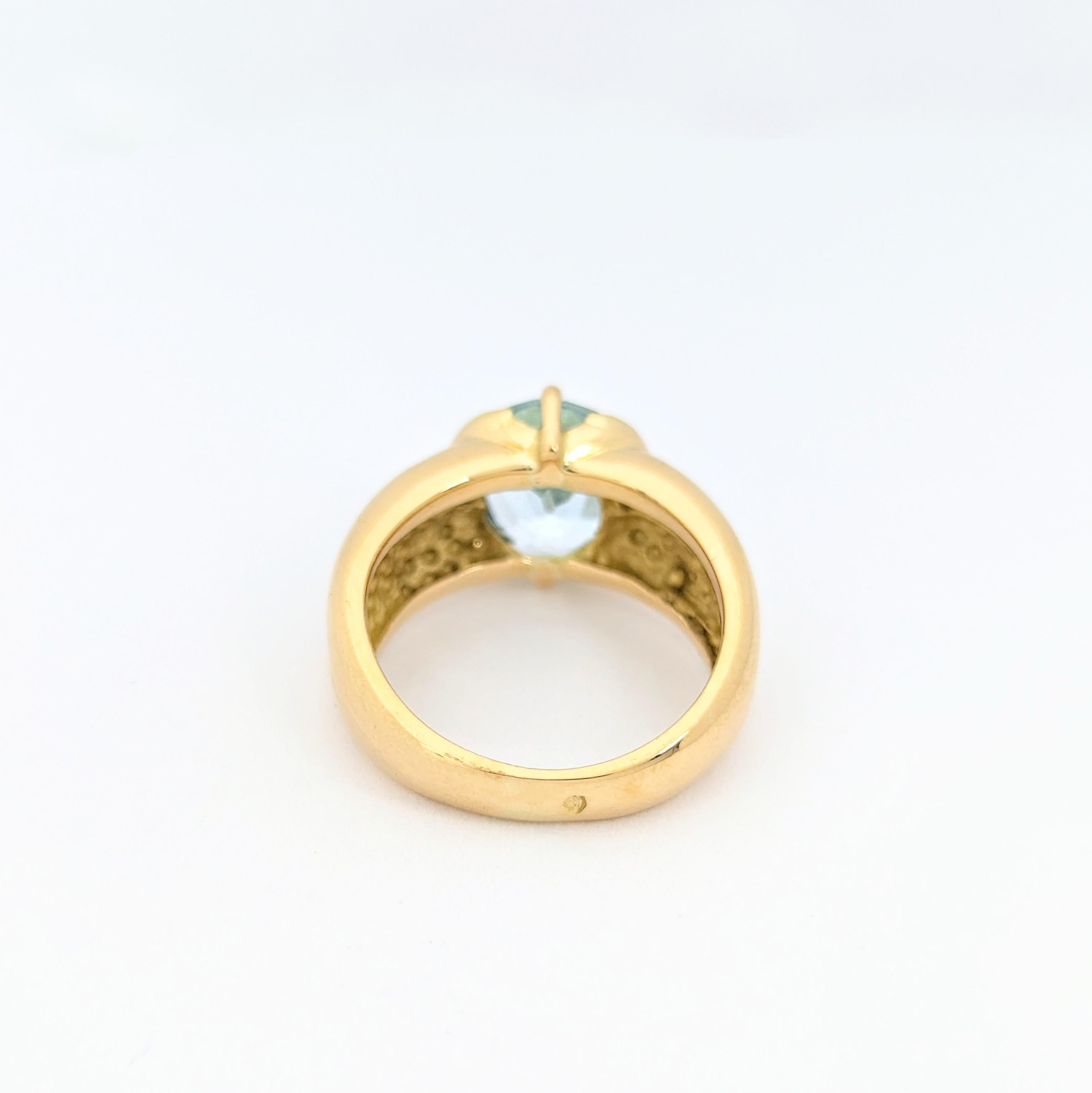 Bague en or jaune et topaze