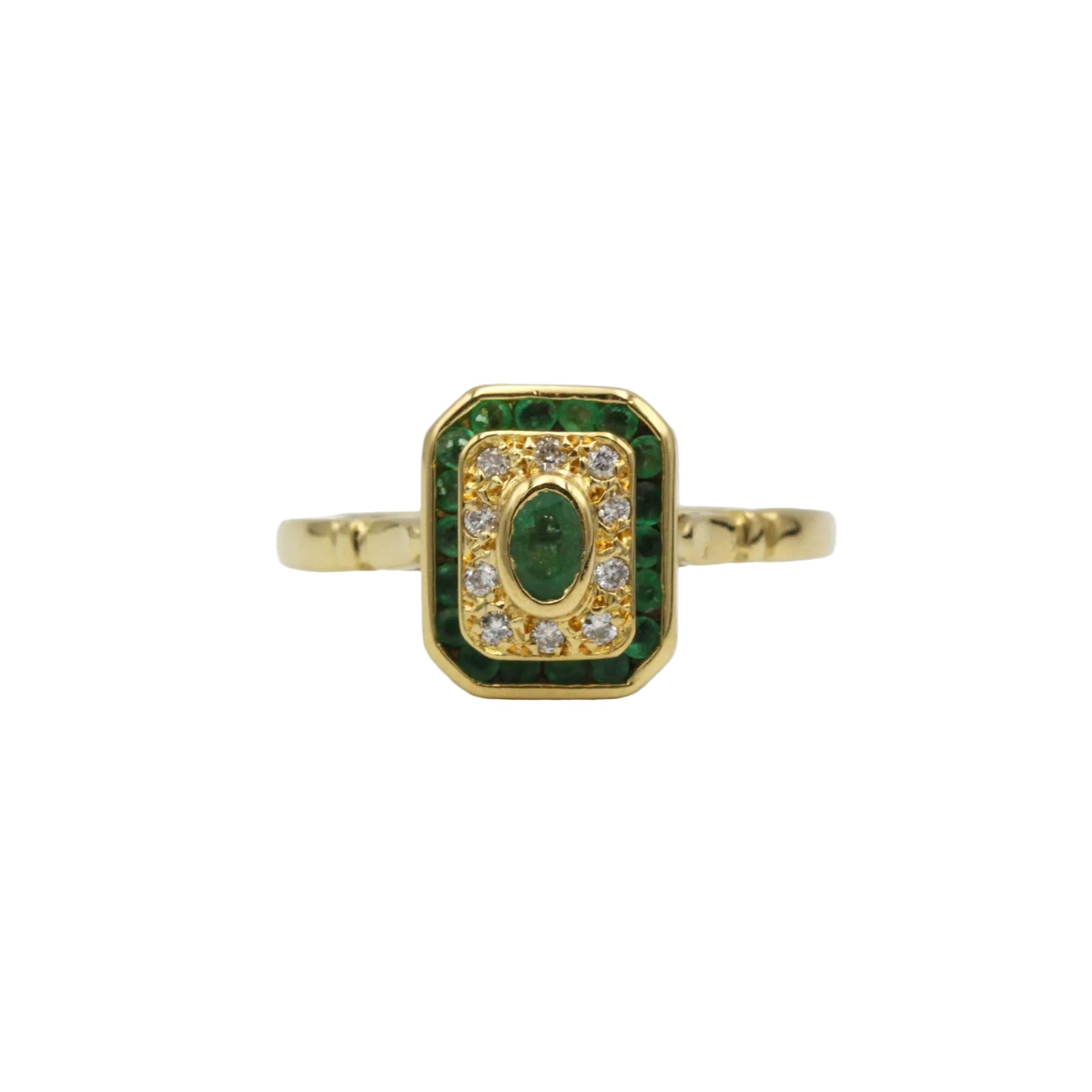 Bague en or jaune et diamants et émeraudes