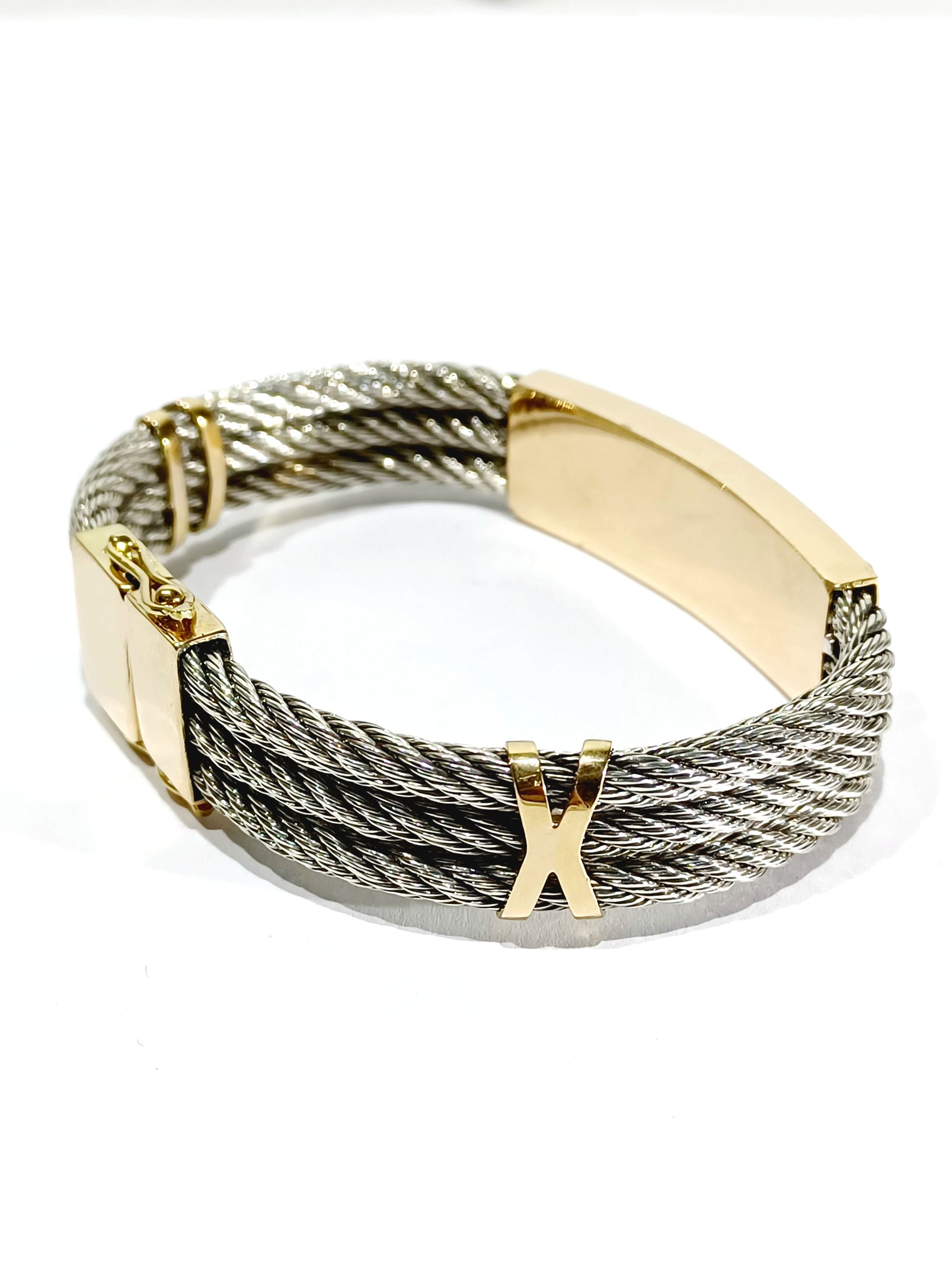 Bracelet at yellow gold and silver