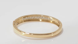 Opening bangle in yellow gold and diamonds 