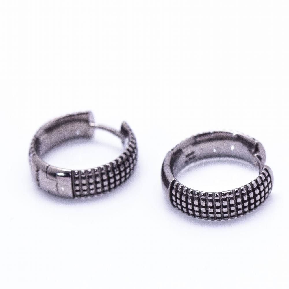 Boucles d'oreilles DAMIANI en or noir. D'occasion