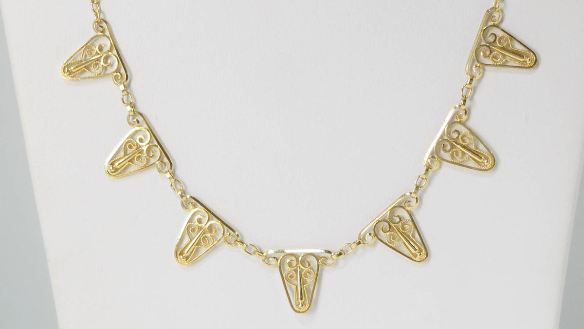 Collier draperie en or filigrané