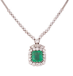 Magnifique collier en or blanc 18k centrée d’une émeraude de Colombie de 14.27 C