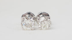 Puces d'oreilles en or blanc et diamants