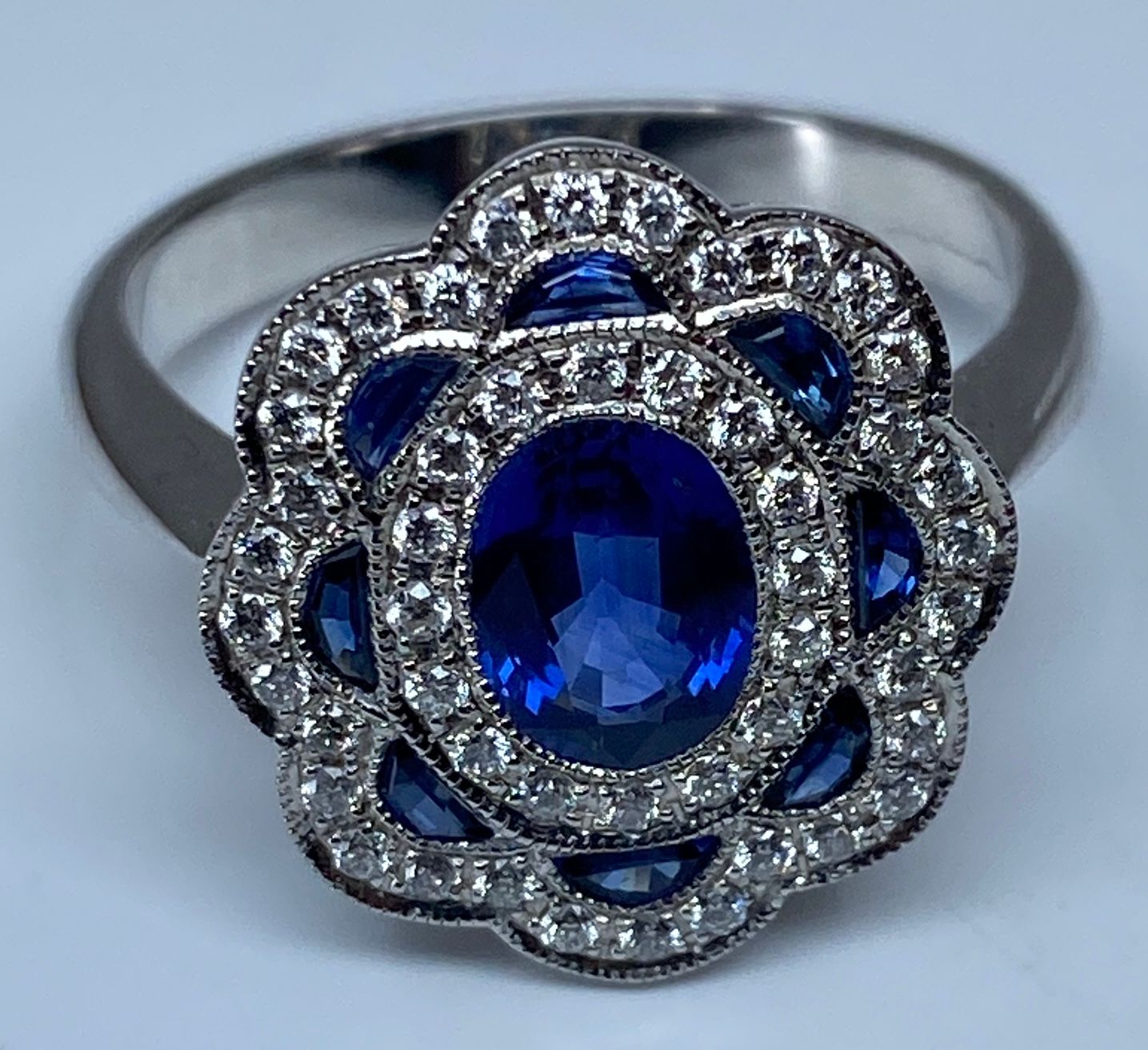 18k gold sapphire and diamond daisy ring