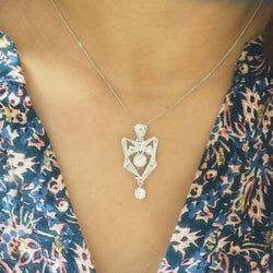 Collier Art déco en or platine et diamants