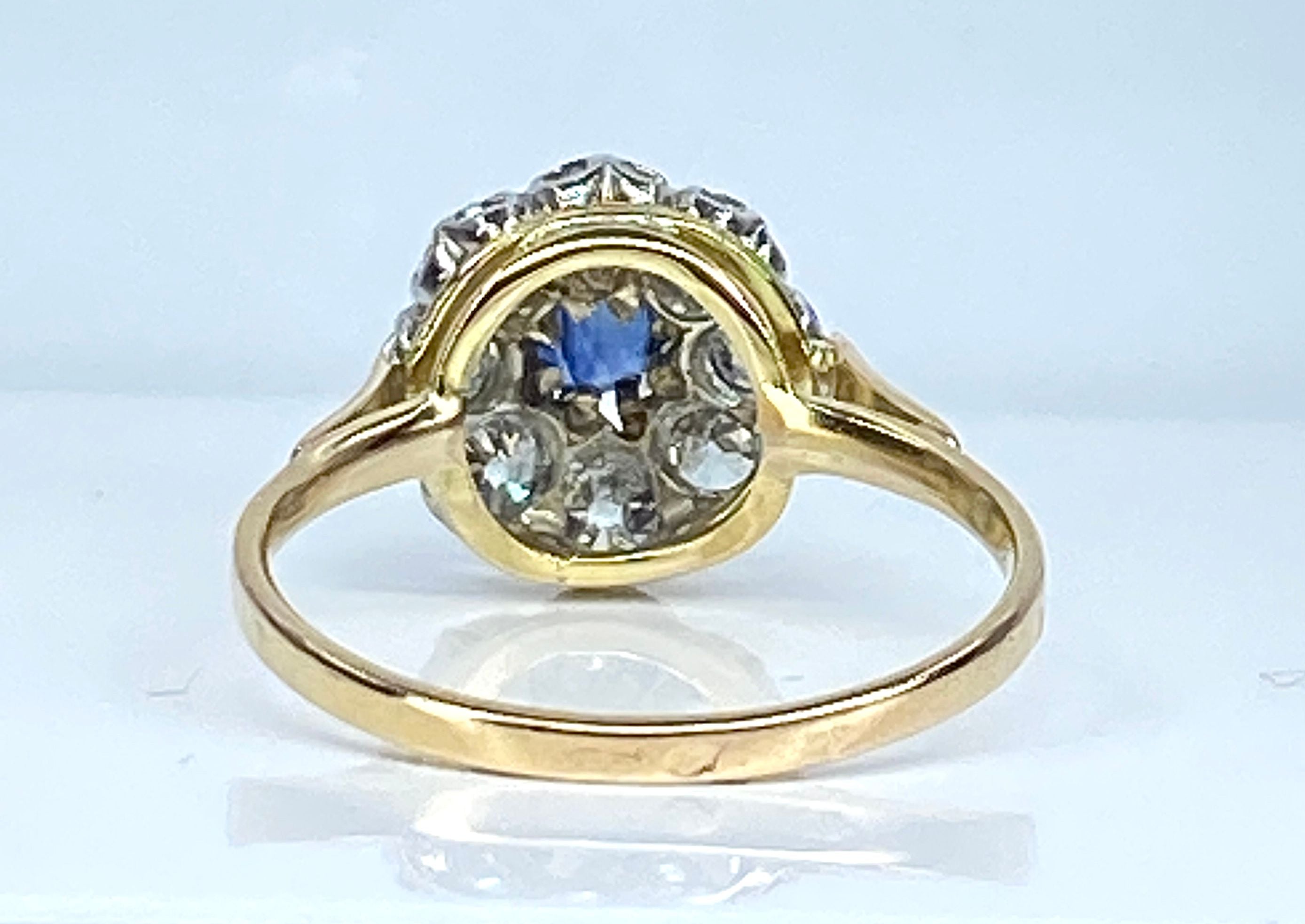 Bague marguerite en or 18 carats, saphir et diamants