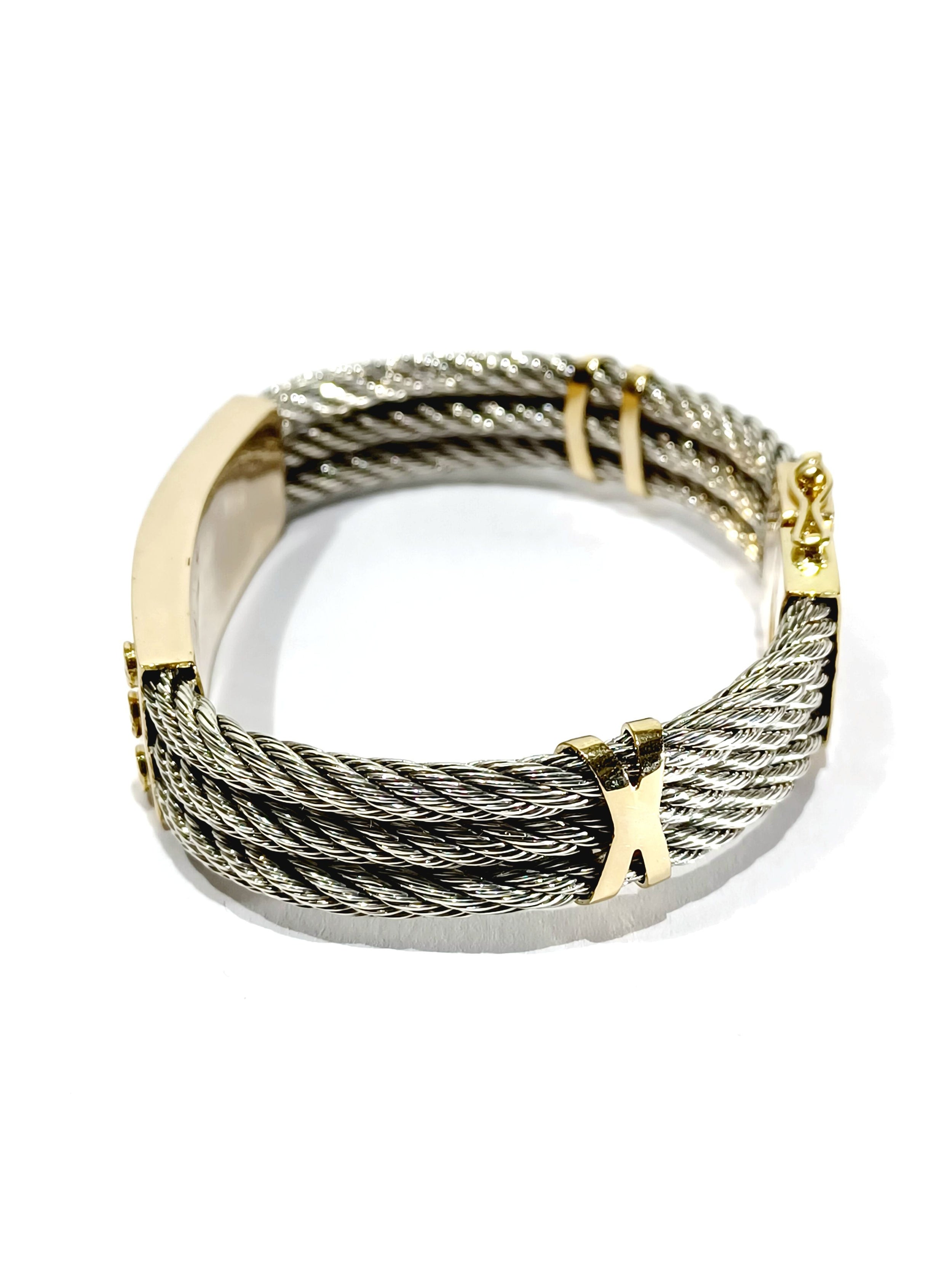 Bracelet at yellow gold and silver