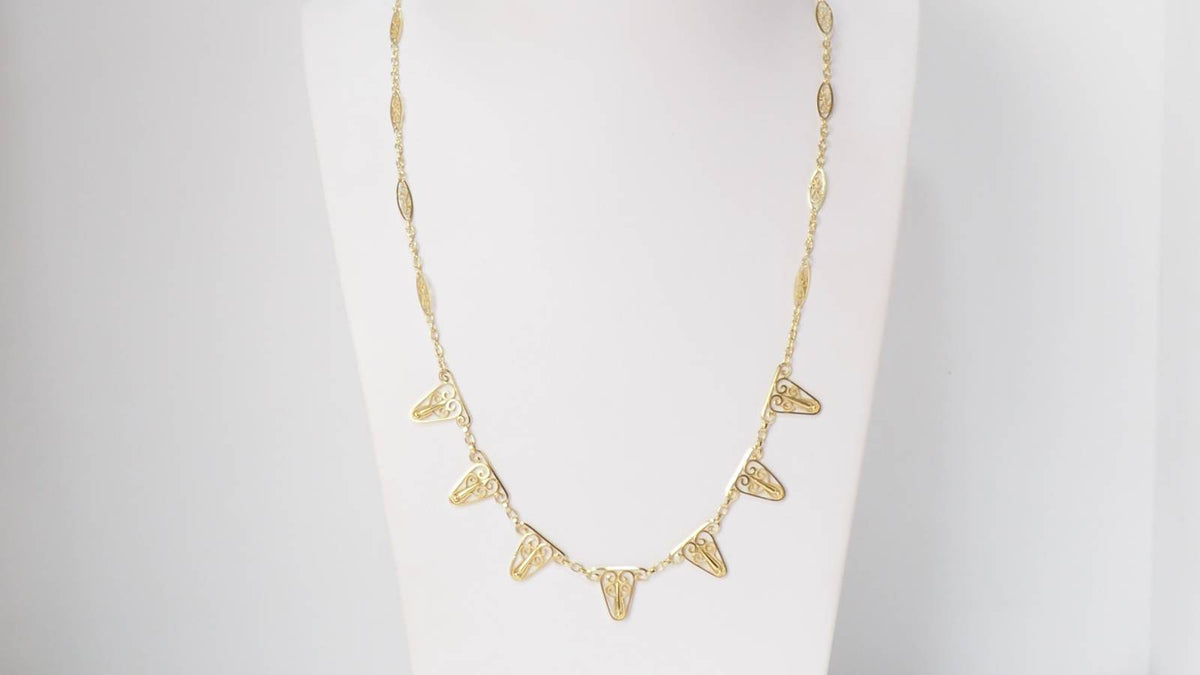 Collier draperie en or filigrané