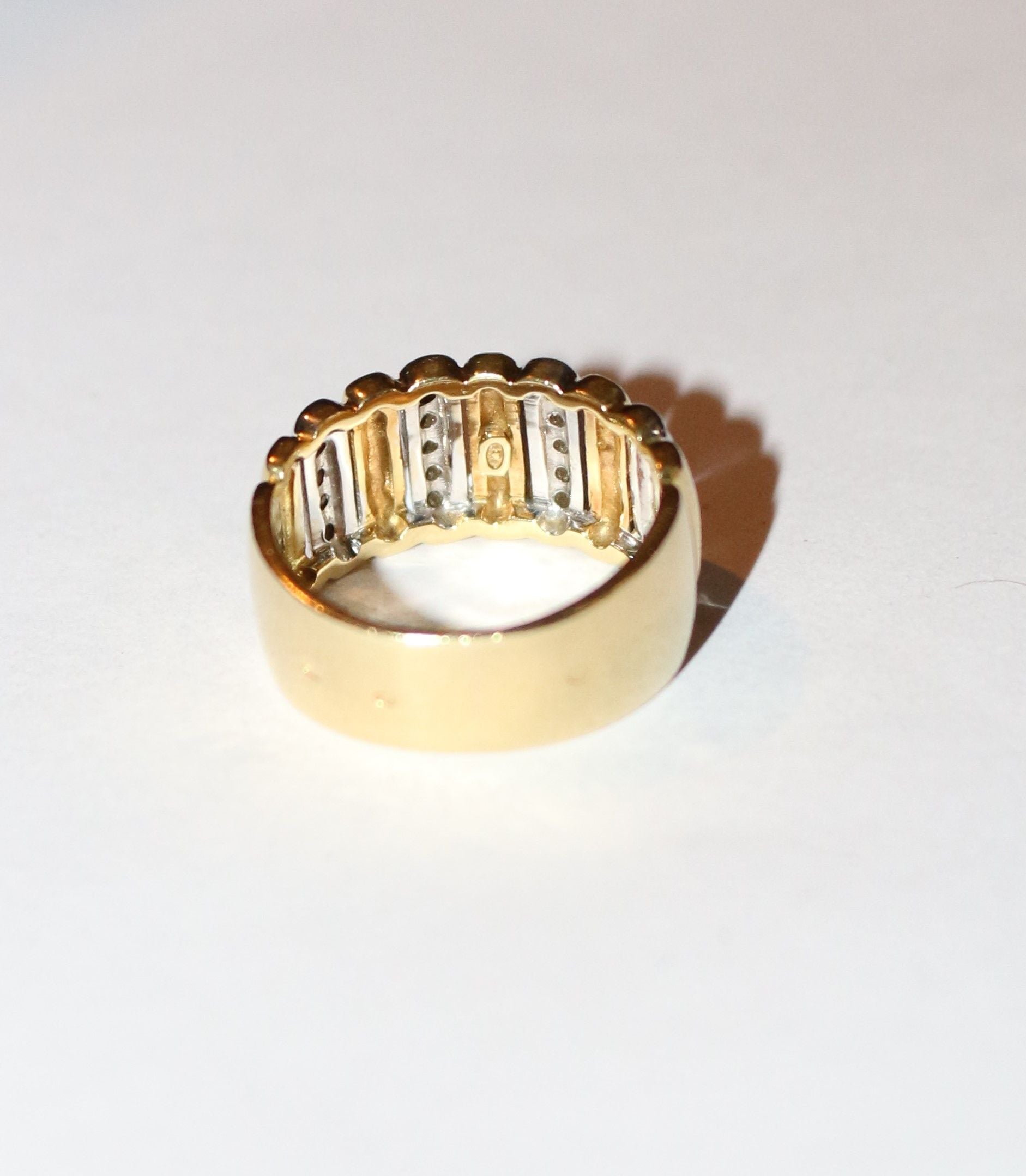 Bandeau ring in yellow gold, white gold and diamonds 