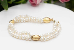 Bracelet perles baroques en or jaune et perles