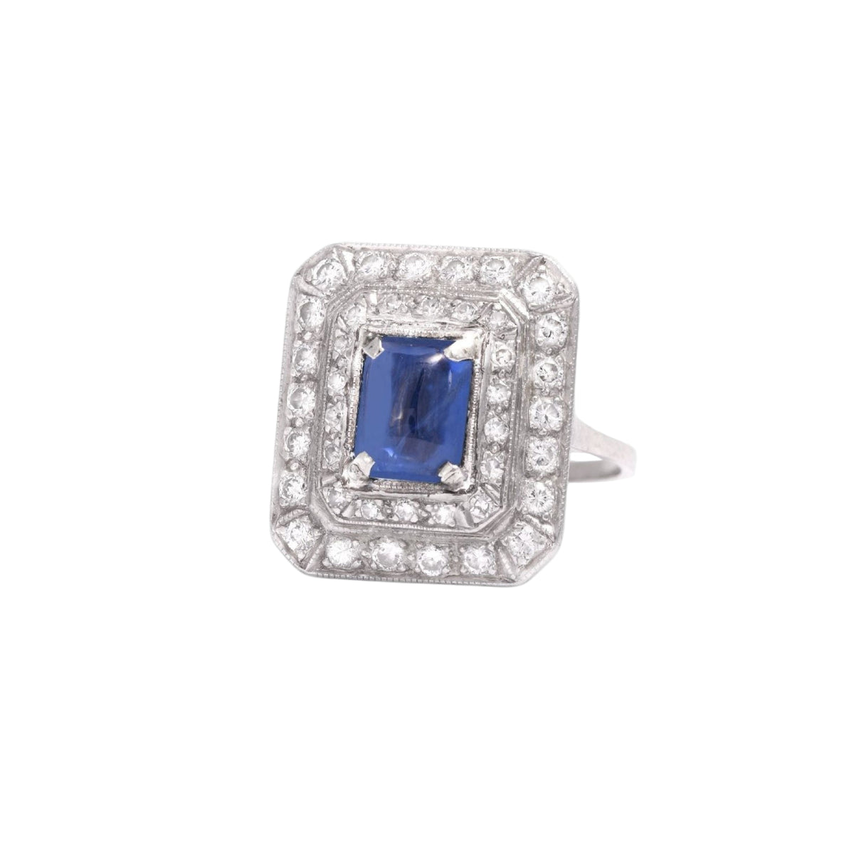 Bague Entourage Art déco, en platine saphir et diamants