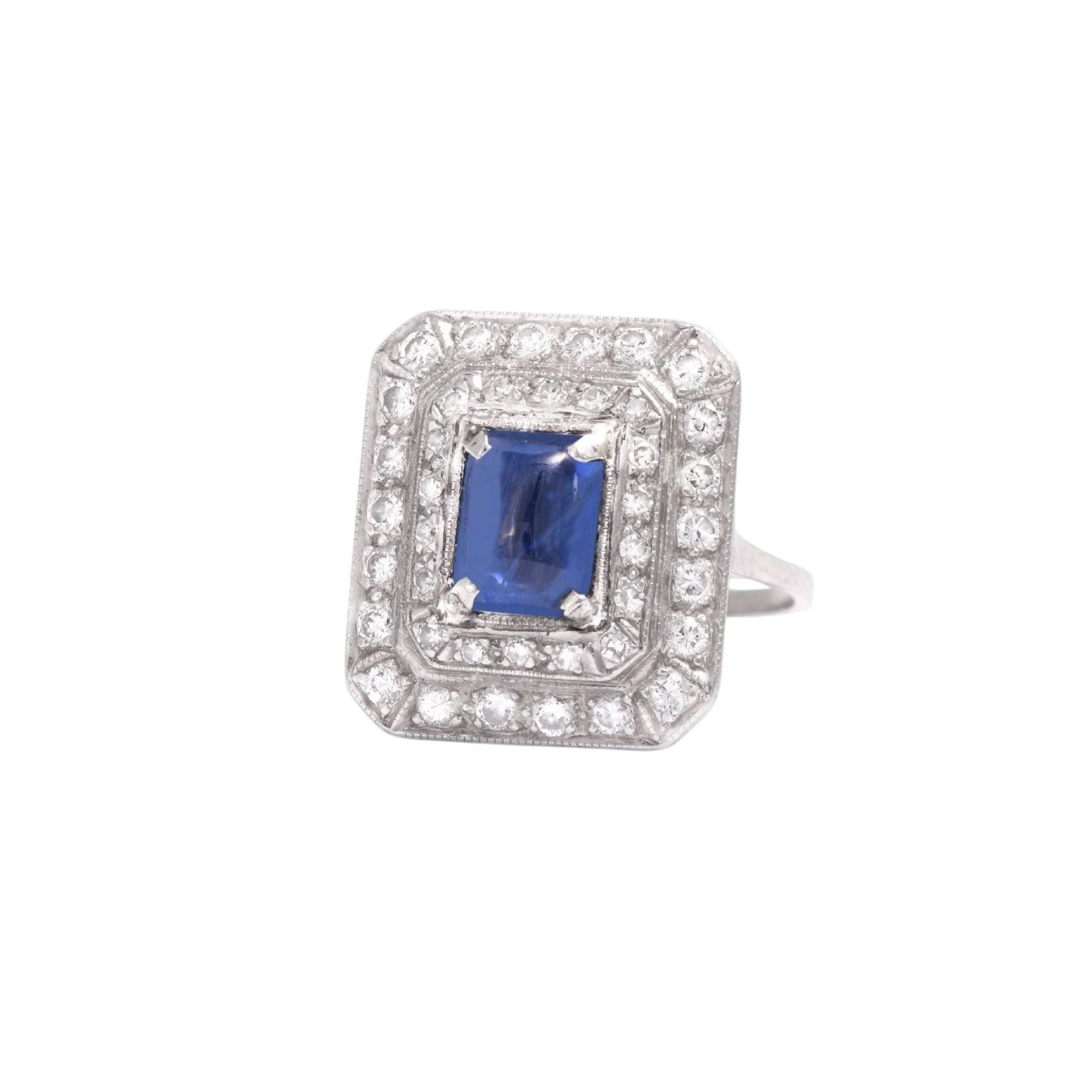 Bague Entourage Art déco, en platine saphir et diamants