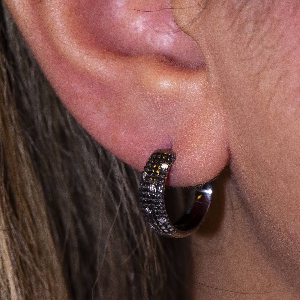 Boucles d'oreilles DAMIANI en or noir. D'occasion