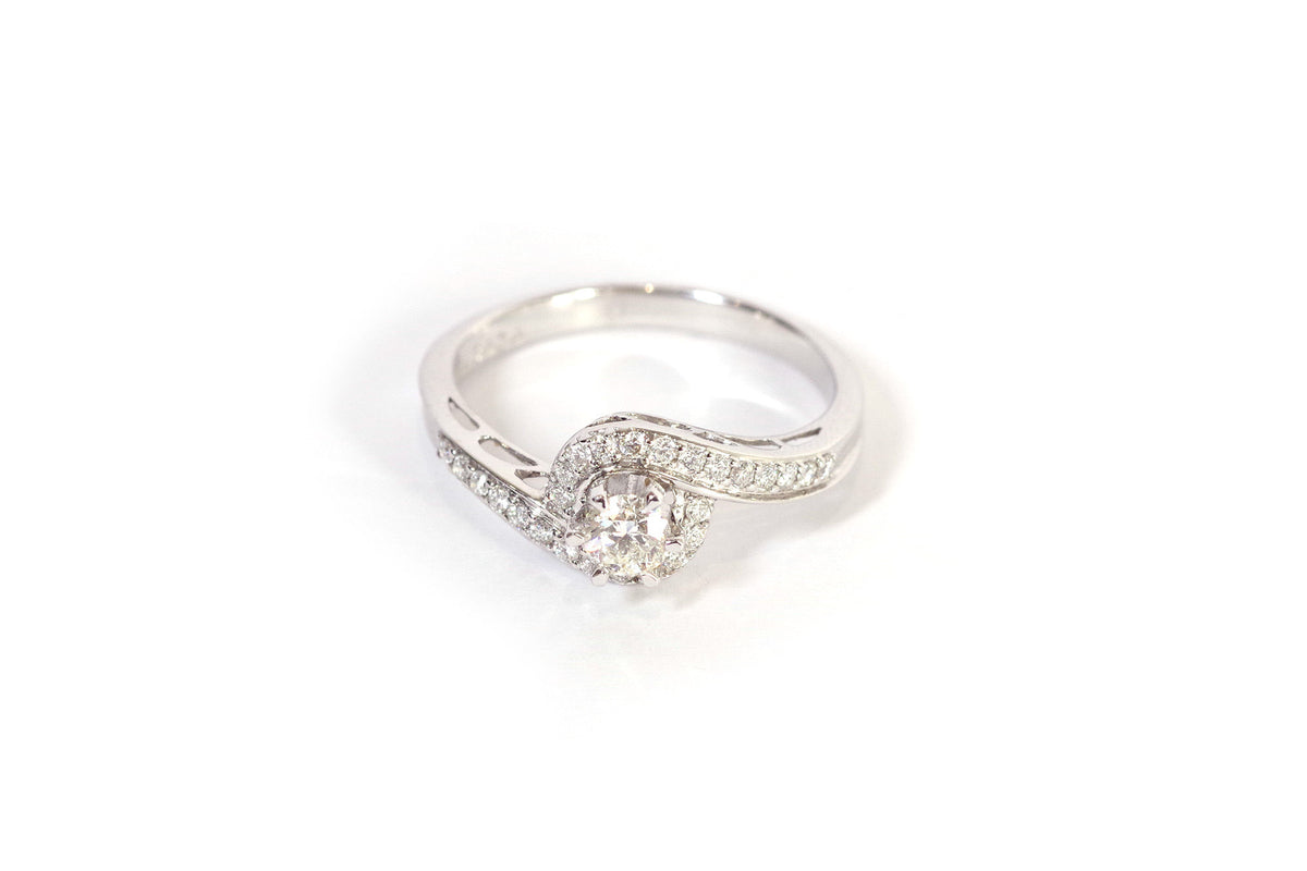 Bague tourbillon diamants en or