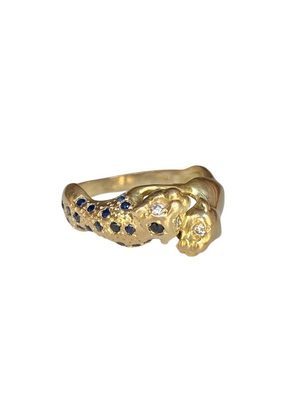 Bague en or jaune 18k représentant l'union de deux panthères