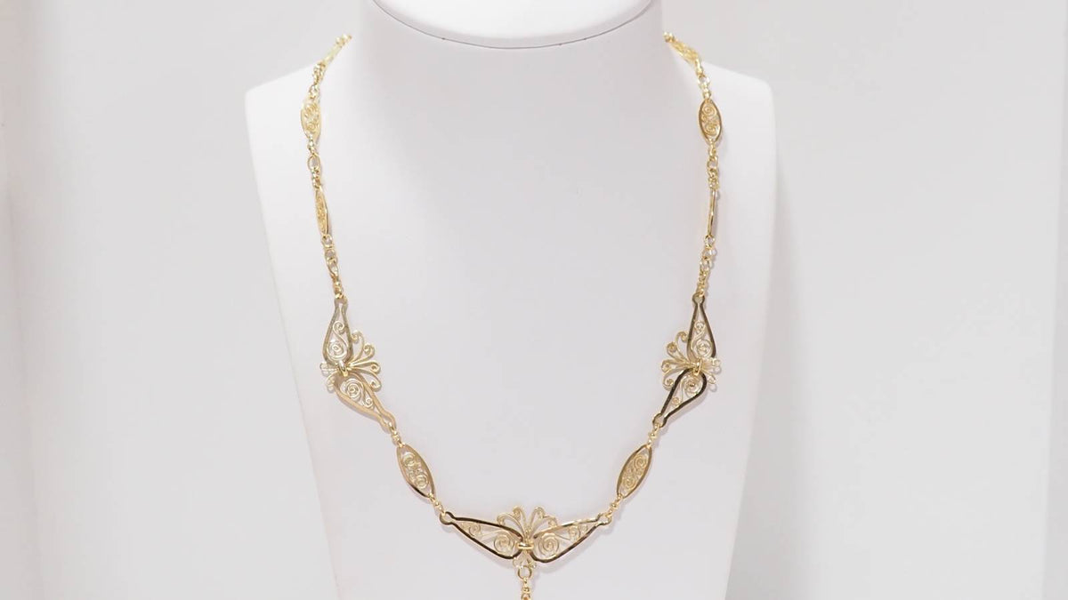 Collier draperie ancien en or jaune