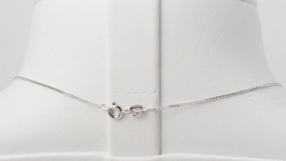 Collier en or blanc, tanzanite et diamants