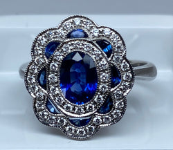 Bague marguerite en or 18 carats en saphirs et diamants