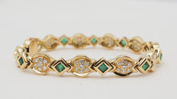Bracelet en or jaune, émeraudes et diamants