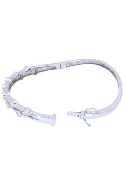 Bracelet jonc ouvrant en or blanc et diamants