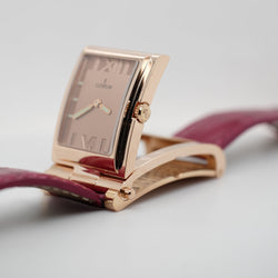 Montre CORUM "Tobogan Flip Up" en or rose et quartz