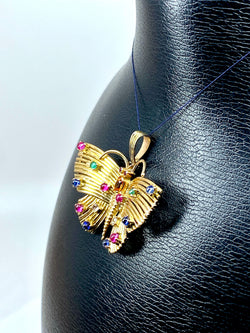 Pendentif papillon en or jaune 18 carats et pierres précieuses