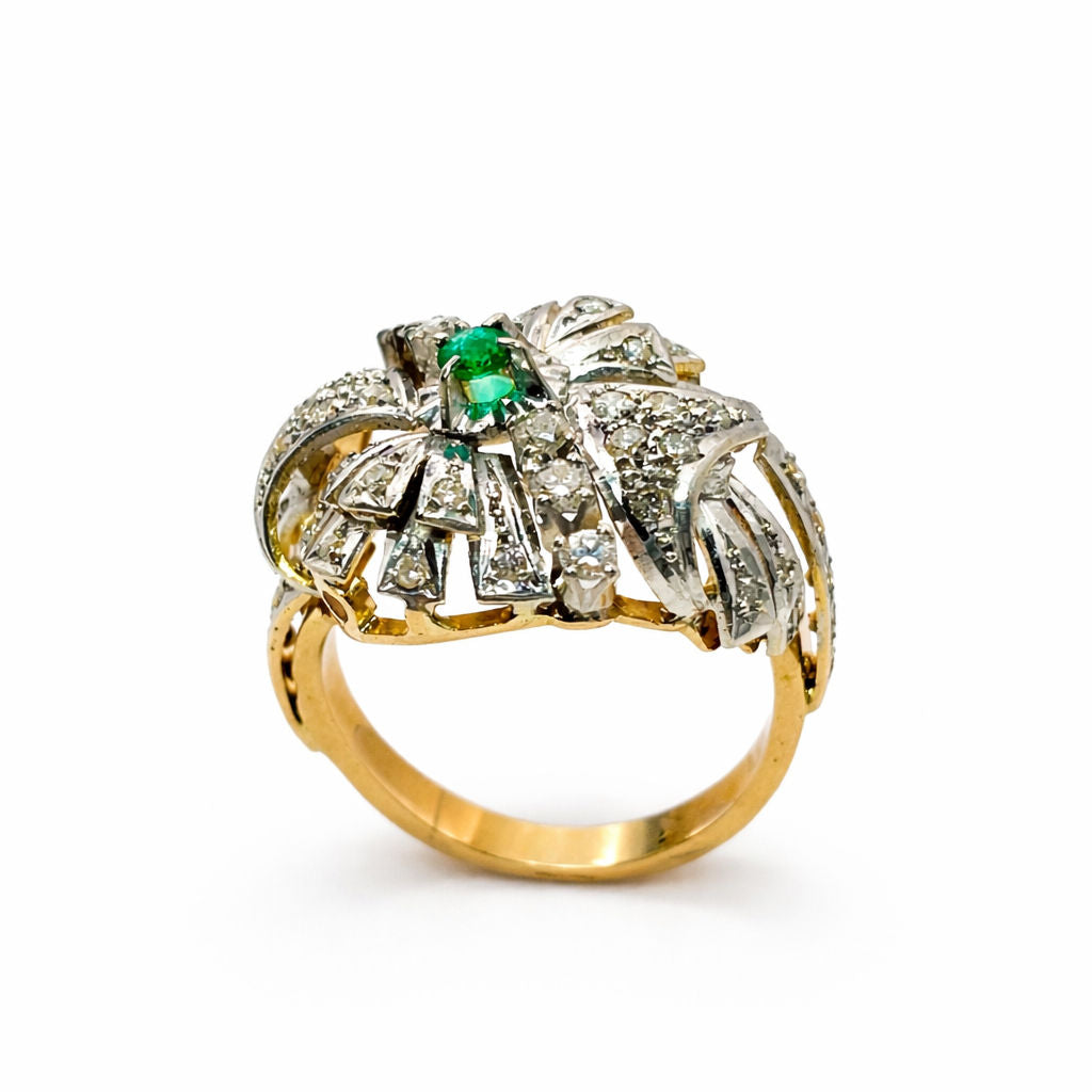 Bague en or jaune et blanc et diamants et émeraude