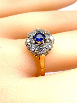 Bague marguerite en or 18 carats, saphir et diamants