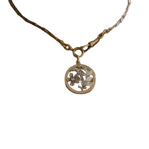 Pendentif en or rose, argent et diamants