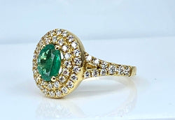 Bague en or jaune 18 carats ornée d’une émeraude et diamants