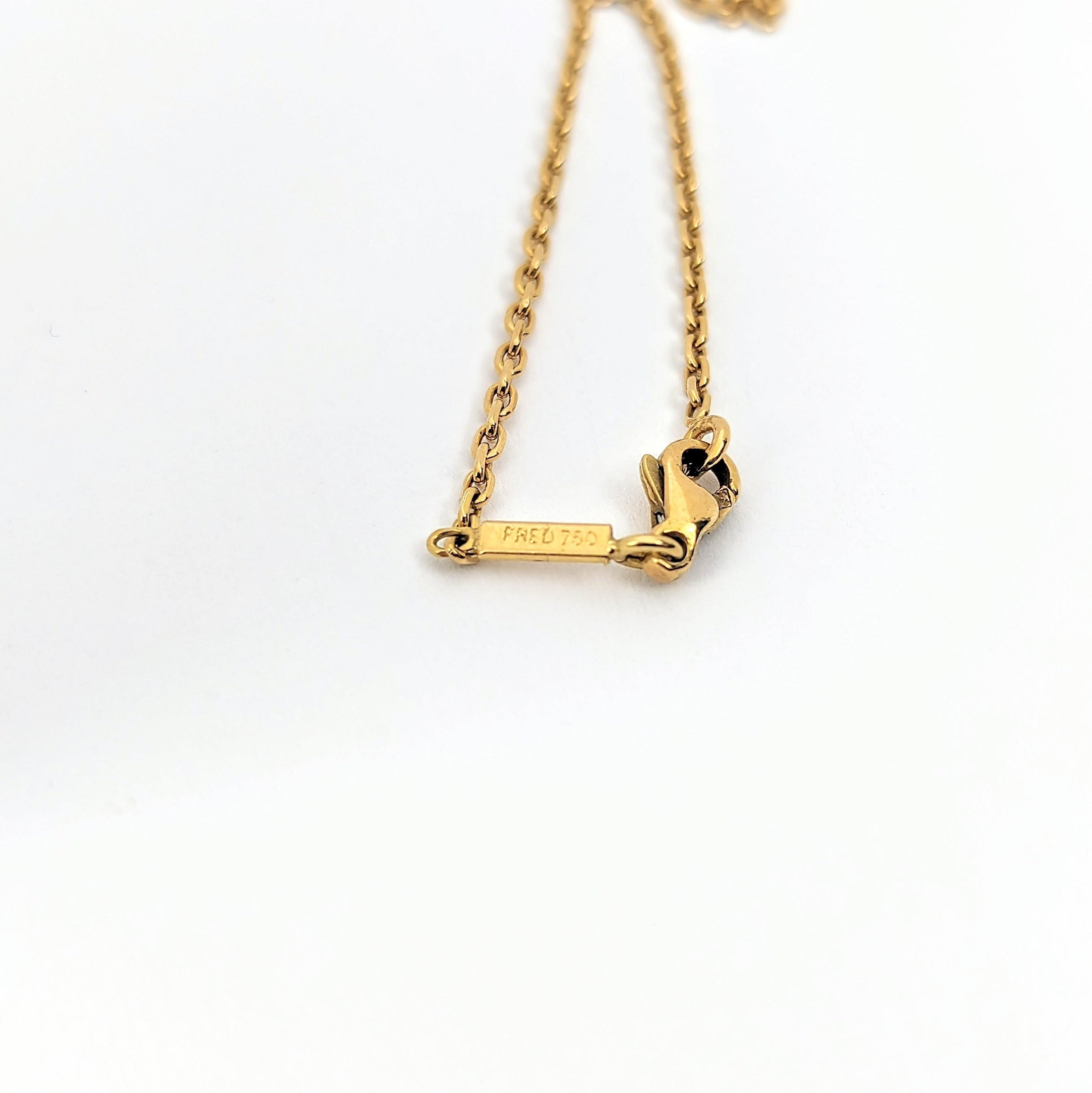 Collier Fred Nœud or jaune diamant et rubis