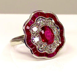 White gold ruby ​​and diamond daisy ring