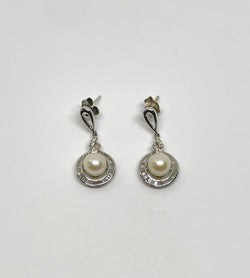 Boucles d’oreilles or blanc perles et diamants