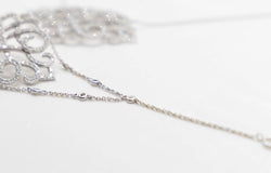 Bracelet maille jaseron en or blanc et diamant