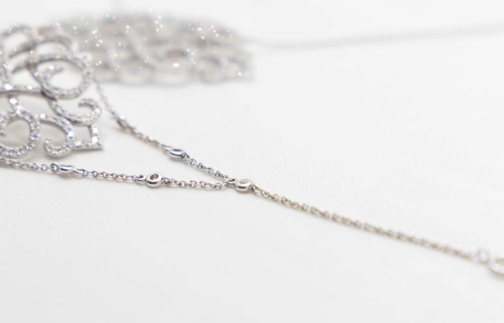 Bracelet maille jaseron en or blanc et diamant