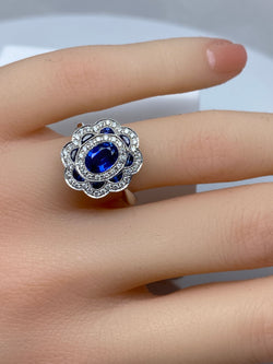 18k gold sapphire and diamond daisy ring