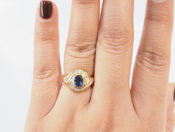 Bague tourbillon en or jaune saphir et diamants