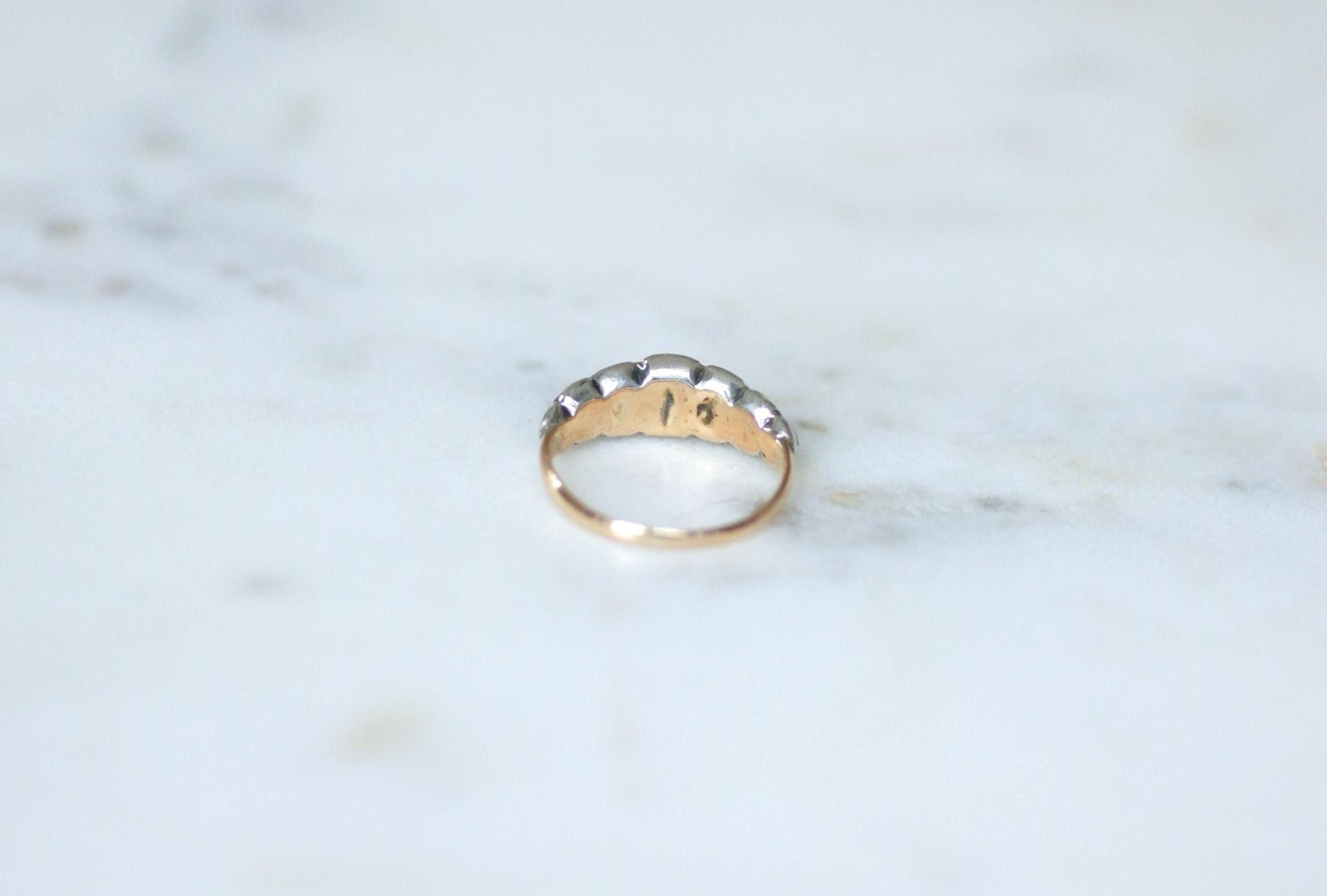 Bague jarretière en or rose et argent et diamants