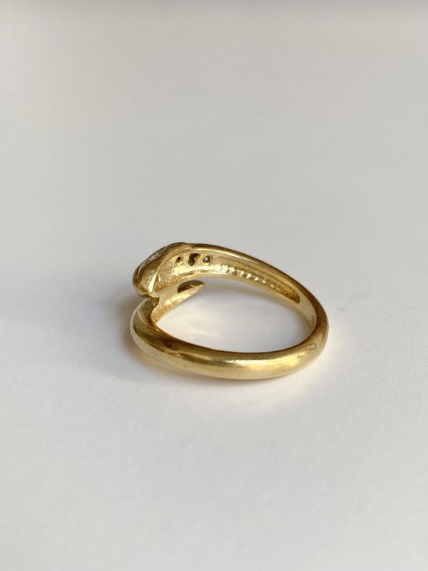 Bague en or jaune 18k en forme de serpent et diamants