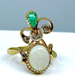 Bague en or jaune et or blanc 18 carats en opale, émeraude et diamants
