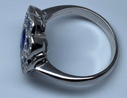 18k gold sapphire and diamond daisy ring