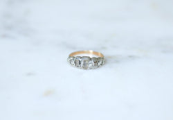 Bague jarretière en or rose et argent et diamants