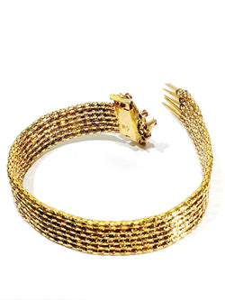 Bracelet Cuff in yellow gold and ruby