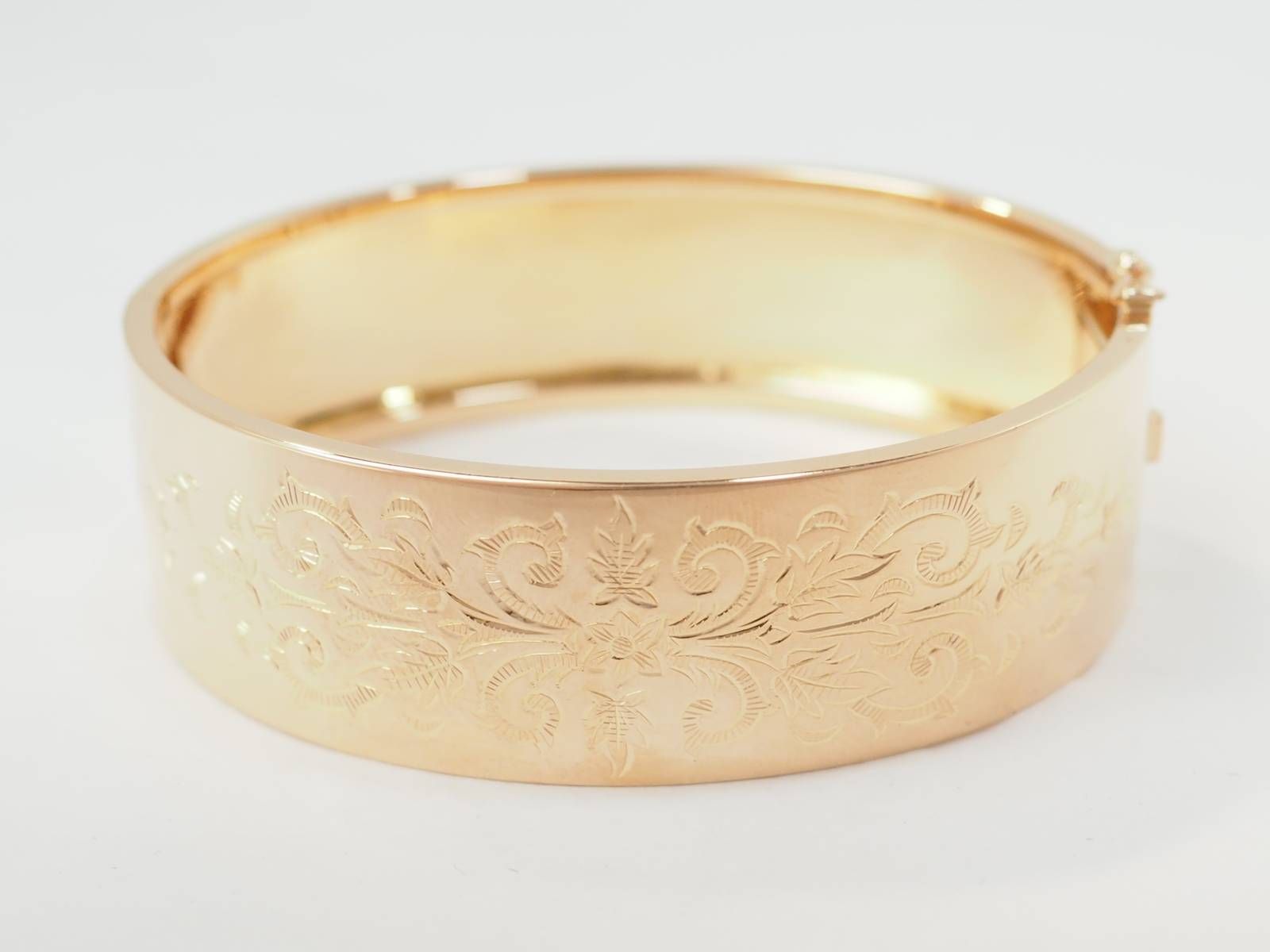 Bracelet jonc décor floral en or rose