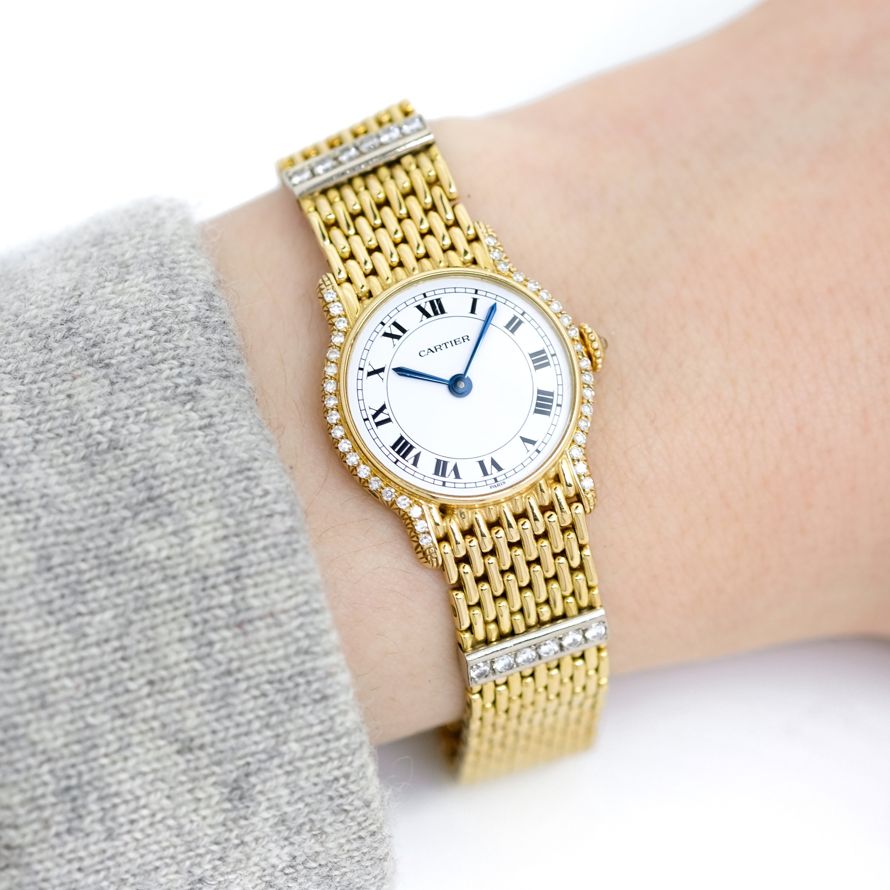 Montre CARTIER Riviera Paris en or jaune et diamants