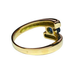 Bague croisée or jaune et saphir