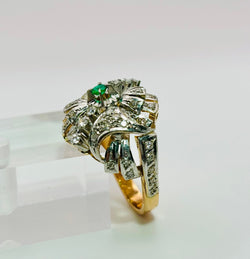 Bague en or jaune et blanc et diamants et émeraude